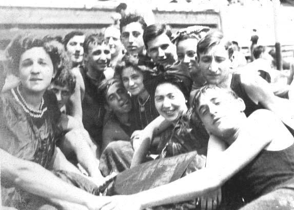 A young Leo Frank (top center) and friends enjoy a day at the beach in New York.